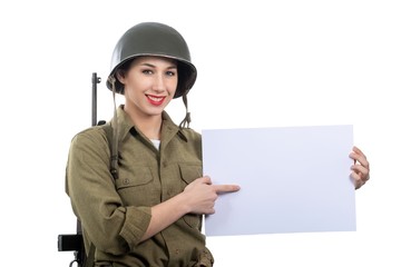 young woman dressed in American ww2 military uniform showing emp