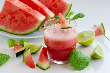 Watermelon smoothie  with lemon and mint to cool down on hot days. Refreshening fruit drink  for hot summer days.
