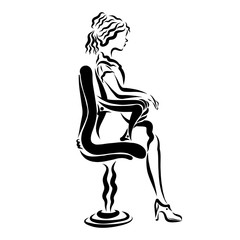 young businesswoman sitting in a modern chair
