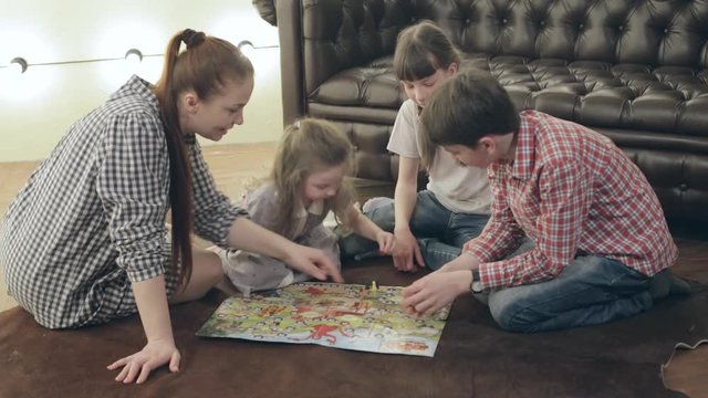 happy family playing Board game