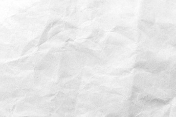 Obraz na płótnie Canvas White crumpled paper texture background. Close-up.