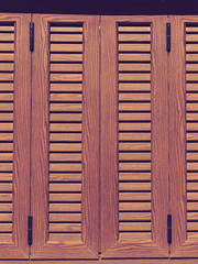 Traditional brown shutters window, Greece
