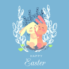    Two hares hugging each other on the background of willow on Easter day