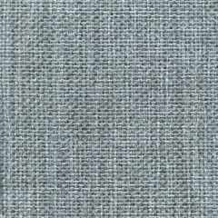 Gray denim textile textured background. Vintage jeanse fashion background for designers and composing collages. Luxury textured genuine fabric of high and natural quality.