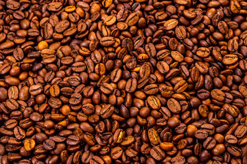 Naklejka premium Roasted coffee bean background 