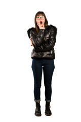 Full-length shot of Woman with glasses with surprise and shocked facial expression