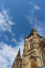 Fototapeta na wymiar Beautiful gothic St. Vitus' Cathedral on Prague Castle with blue Sky background, touristic place