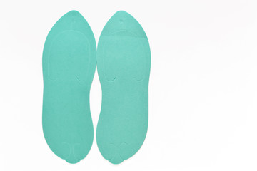 green disposable pedicure Slippers on white background isolated