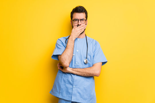 Surgeon Doctor Man Covering Mouth With Hands For Saying Something Inappropriate