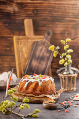 Easter cake with raisins and candied fruits on a cutting board