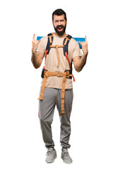 Hiker man making rock gesture over isolated white background