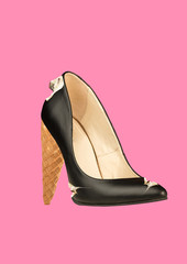 An alternative shoes. Another view of sweets for woman. A black leather female shoe filled with cream and icecream horn as a heel against coral background. Modern design. Contemporary art collage.