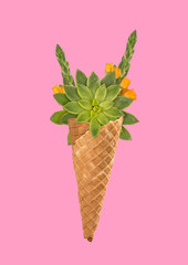 A natural icecream. Green plants with yellow tulips as a blossoming creamy ice in horn on trendy coral background. Nature friendly and healthy food concept. Modern design. Contemporary art collage.