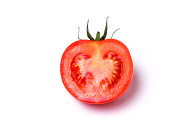 Slice of ripe red tomato on white isolate background.