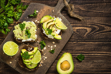 Sandwiches with avocado and cream cheese.