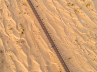 aerial view of highway on the gobi desert xinjiang， 