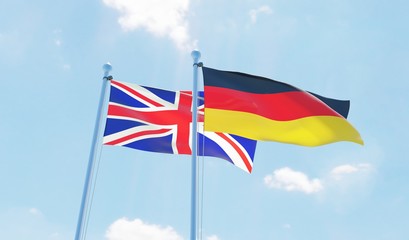 Germany and UK, two flags waving against blue sky. 3d image
