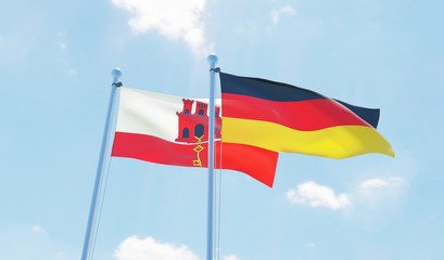 Germany and Gibraltar, two flags waving against blue sky. 3d image