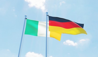 Germany and Ireland, two flags waving against blue sky. 3d image