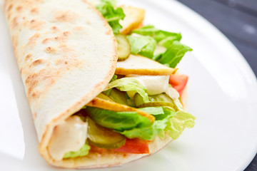 sandwich wrap with meat and vegetables