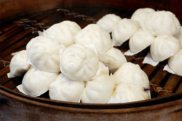 Delicious Chinese Pork Buns in the Bamboo Steamer