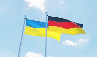 Germany and Ukraine, two flags waving against blue sky. 3d image