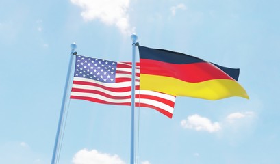 Germany and USA, two flags waving against blue sky. 3d image