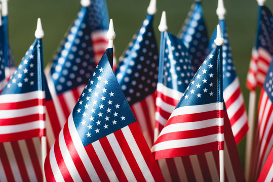 selective focus of stars and stripes on american flags