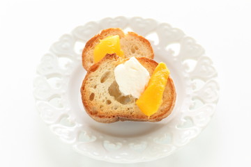 Mango and mascarpone cheese toast on dish