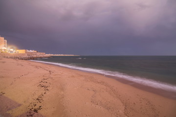 Twilight in Cadiz city Andalusia Spain Caleta beach and San Sebastian castle