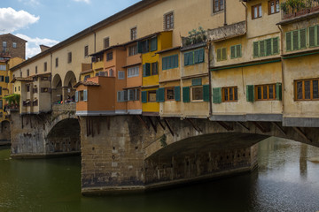 Fototapeta na wymiar A close up view from the side of the famous Ponte Vecchio, this bridge that crosses the River Arno in Florence was the only one not destroyed in Florence during world war II