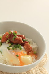 Japanese food, canned Yakitori and egg on rice