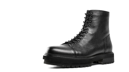 Men's fashion leather shoes for autumn, spring, European winter. Boots for a modern grunge woman. Women's black boots with laces isolated on white. Black Leather Army Boots. Autumn. Fashion. Style.