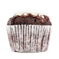 Tasty chocolate cupcakes on white background. Chocolate caramel cupcake and butterscotch syrup. Chocolate cupcake isolated on white.