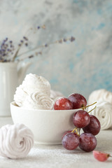 Homemade zephyr and mint on an old wooden table covered 