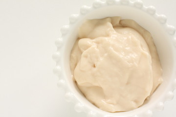 Fototapeta na wymiar White sauce on bowl for prepared food ingredient image