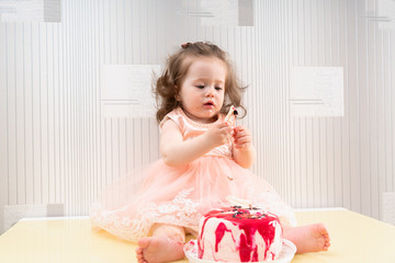 Adorable little girl getting herself messy
