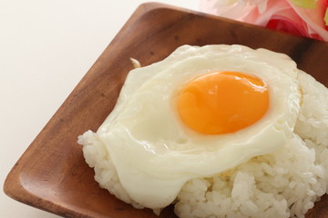 Asian style of sunny side up fried up on rice 