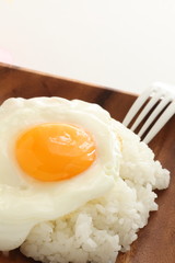 Asian style of sunny side up fried up on rice 