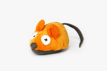soft orange mouse toy made of artificial wool, handmade on a white background