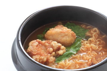 Korean food, fried chicken in hot pot ramen noodles