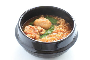 Korean food, fried chicken in hot pot ramen noodles