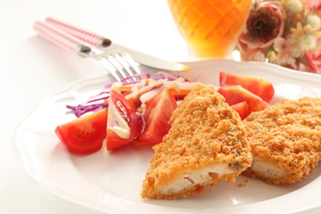deppr fried fish served with tomato salad for Japanese food image