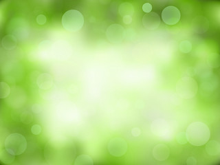 Green abstract bokeh background. Nature blurred backdrop with lights. Vector eps 10.