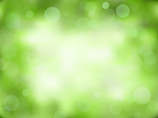 Fototapeta premium Green abstract bokeh background. Nature blurred backdrop with lights. Vector eps 10.