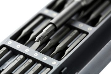 Set of bits for screwdriver. Metal bits for screwdriver. Tool set for household use. Nozzles and adapters for screwdrivers. Head different size hex driver.
