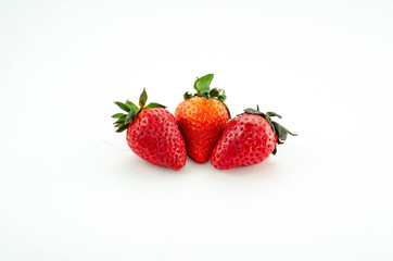  fresh strawberries. white background. crop 2019. one or several