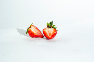  fresh strawberries. white background. crop 2019. one or several