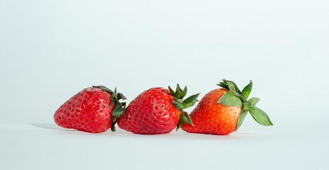  fresh strawberries. white background. crop 2019. one or several