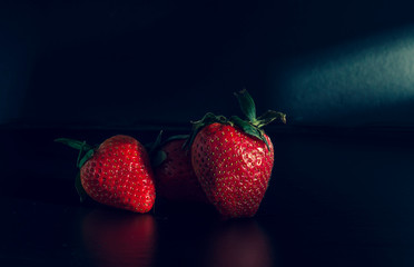 fresh strawberries. black background. crop 2019. one or more. Healthy food. Healthy lifestyle